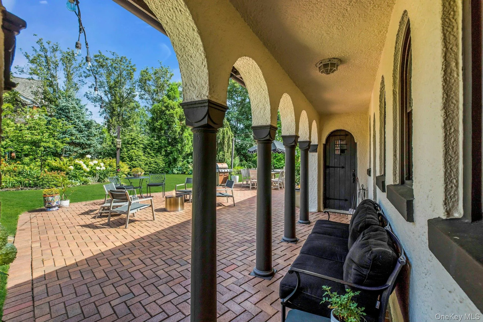 Courtyard leading from main house to guest cottage Courtyard leading from main house to guest cottage