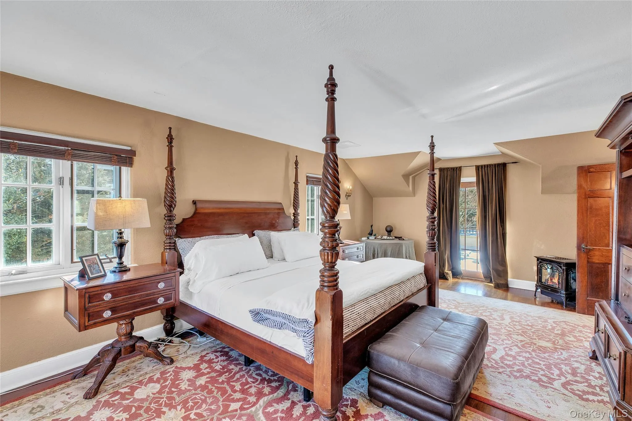 Hardwood flooring, multi-pane casement windows, a built-in electric stove, and a vaulted ceiling with dormer windows Hardwood flooring, multi-pane casement windows, a built-in electric stove, and a vaulted ceiling with dormer windows