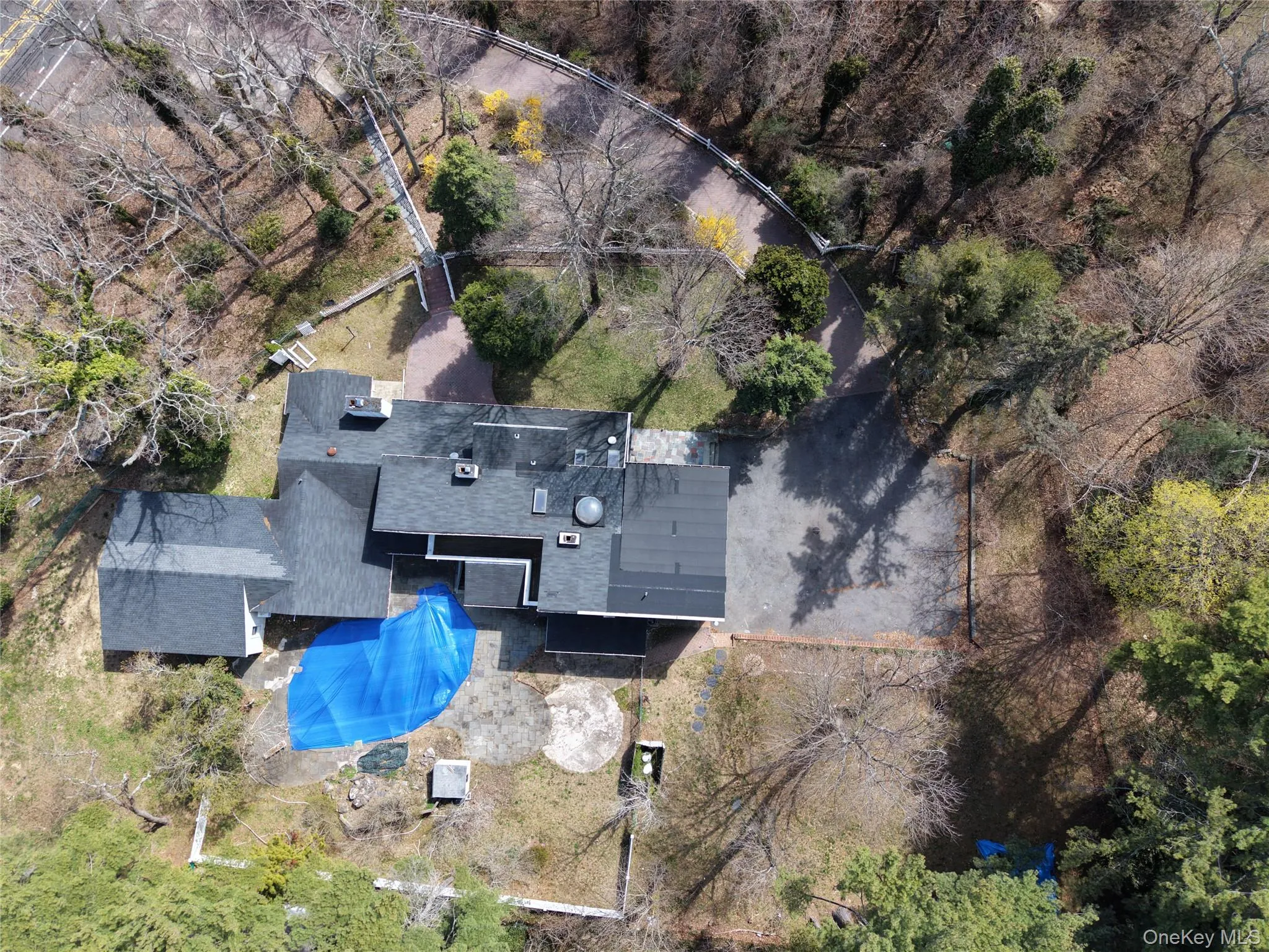 Aerial view of property and lot. Aerial view of property and lot.