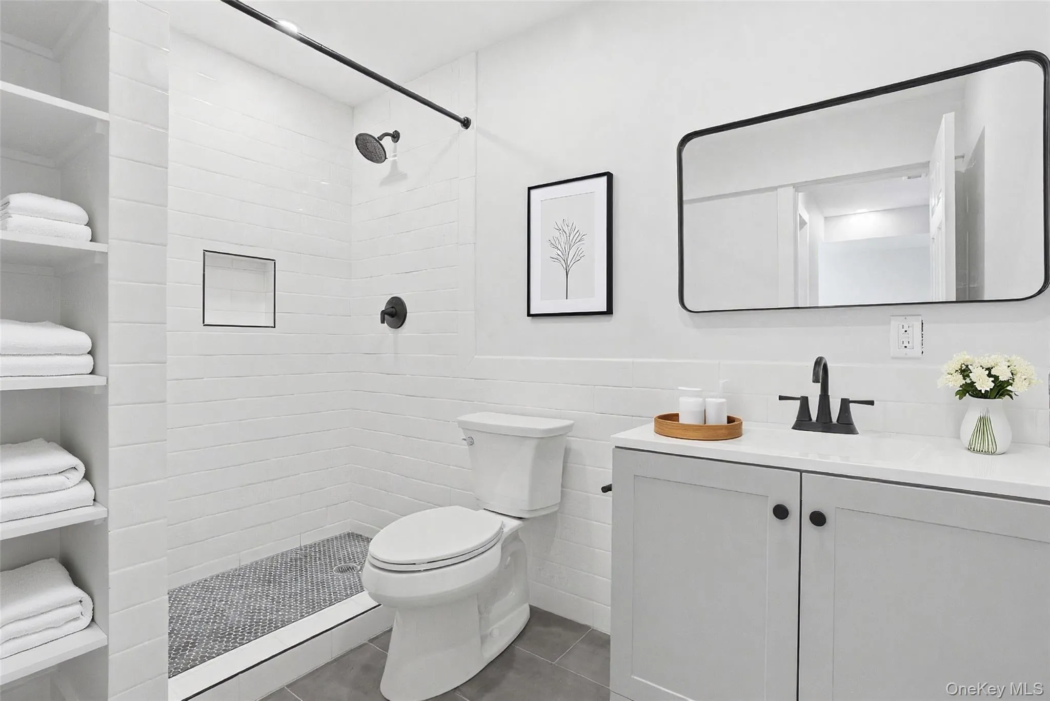 Primary ensuite featuring modern fixtures and contemporary style. Primary ensuite featuring modern fixtures and contemporary style.