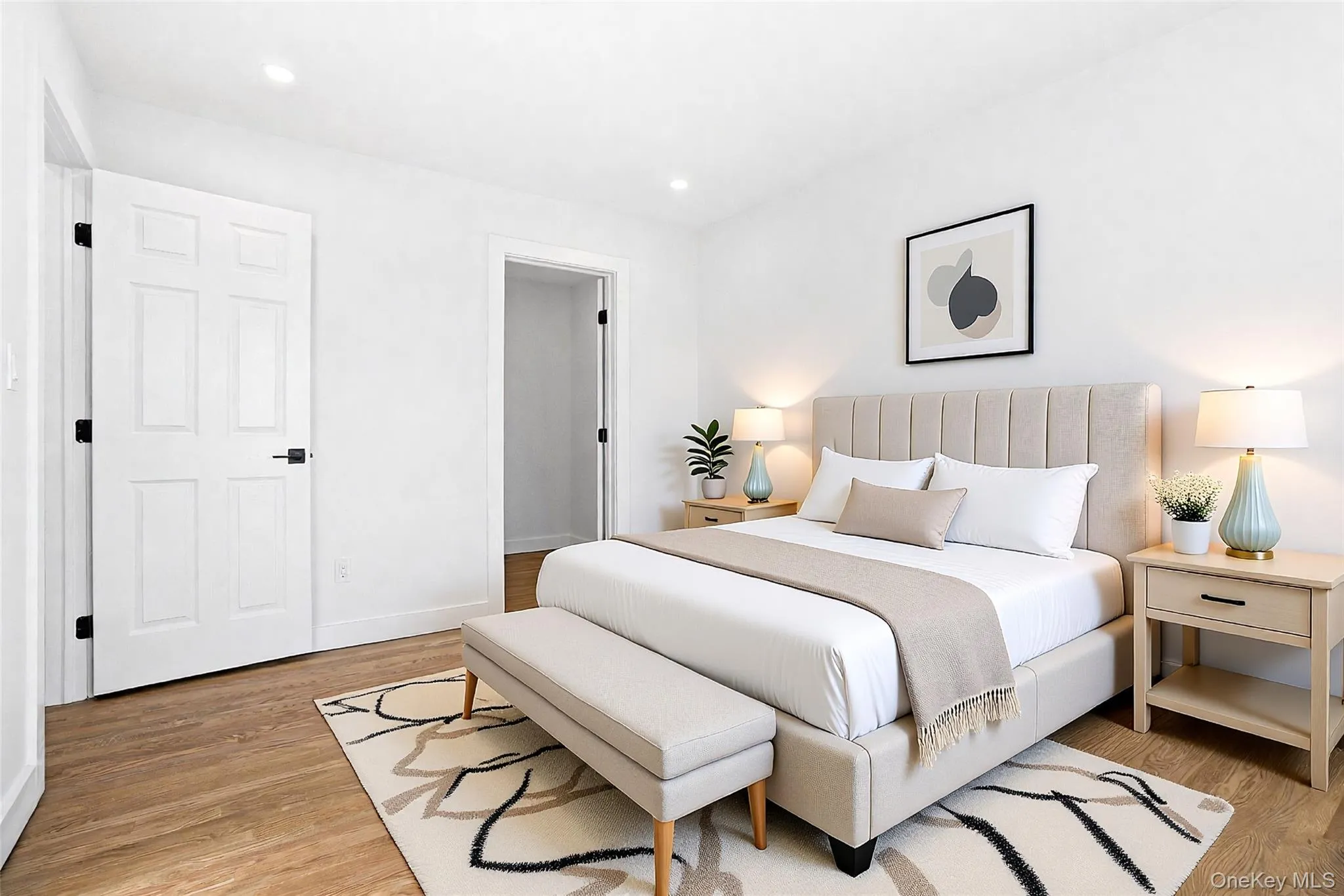 Serene primary bedroom virtually staged to highlight the room’s spacious layout and potential for a comfortable, private retreat. Serene primary bedroom virtually staged to highlight the room’s spacious layout and potential for a comfortable, private retreat.