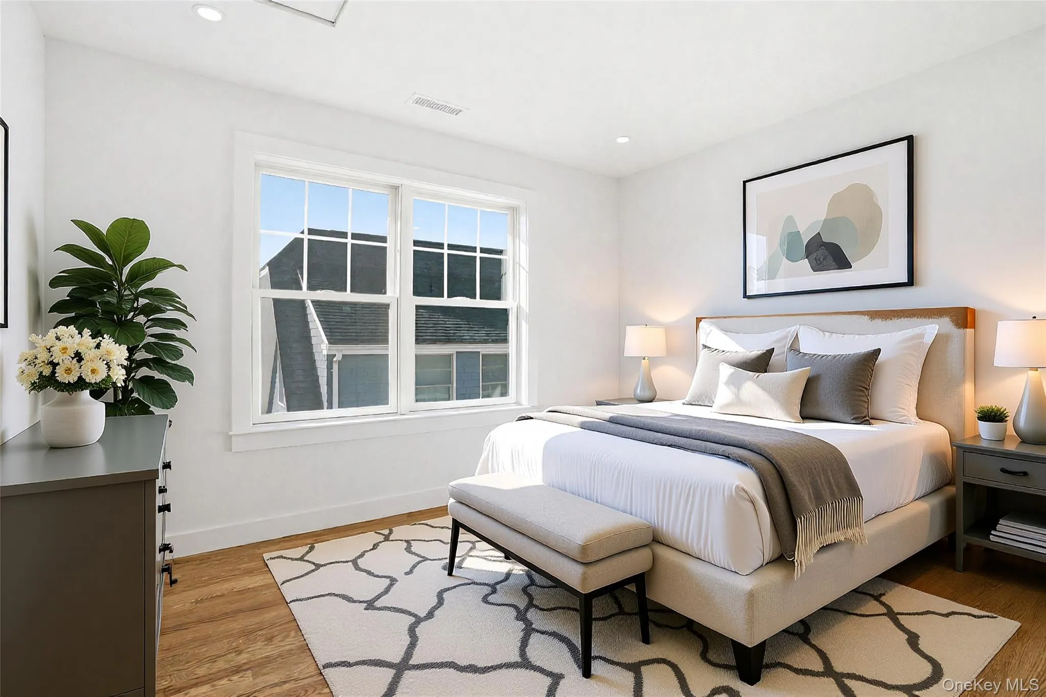 Bright third bedroom virtually staged to showcase its comfort and versatility Bright third bedroom virtually staged to showcase its comfort and versatility