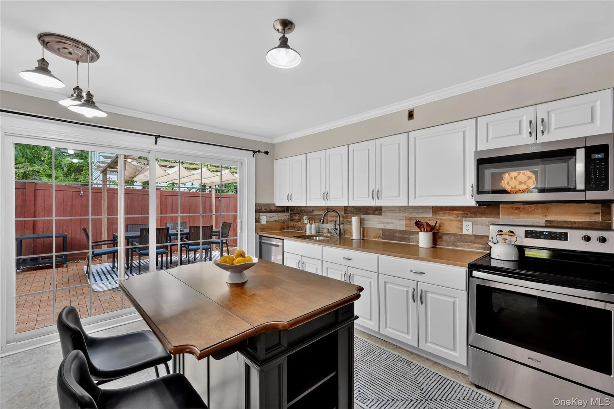 Kitchen with SGD to back patio Kitchen with SGD to back patio