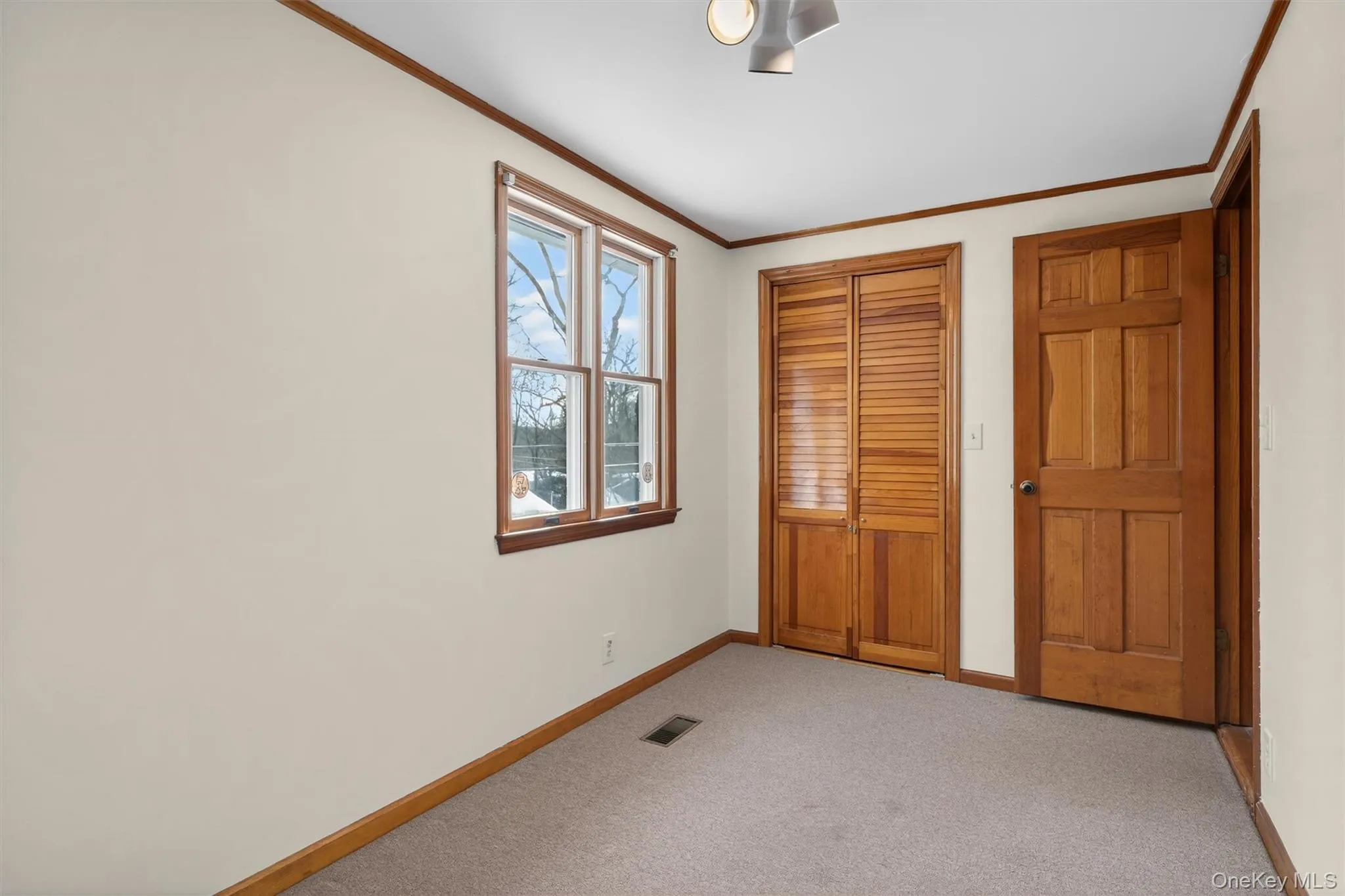 Bedroom with two closets Bedroom with two closets
