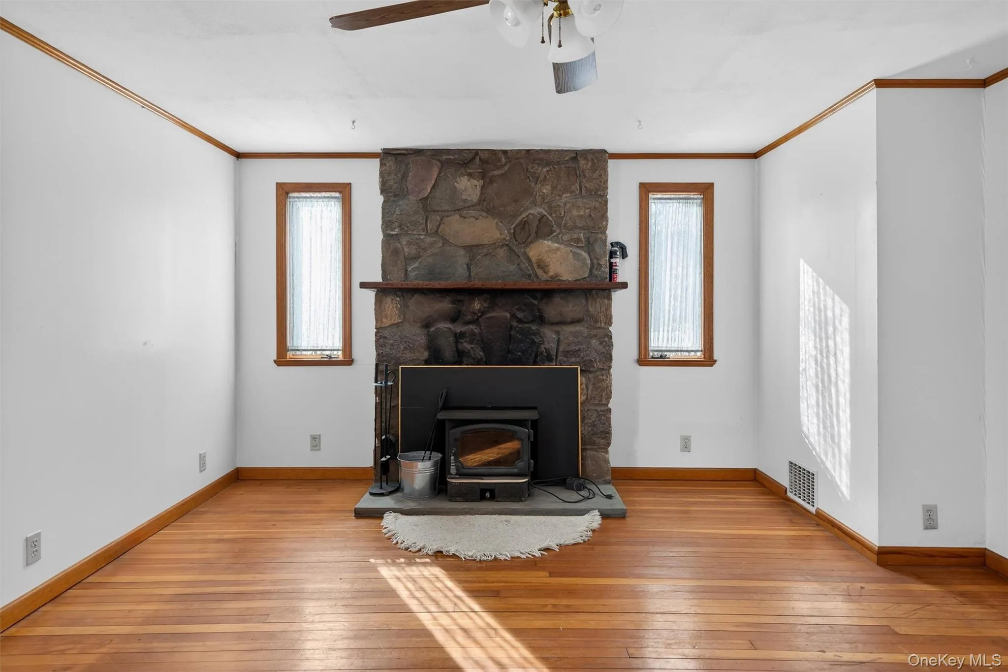 Living room with stone fireplace Living room with stone fireplace