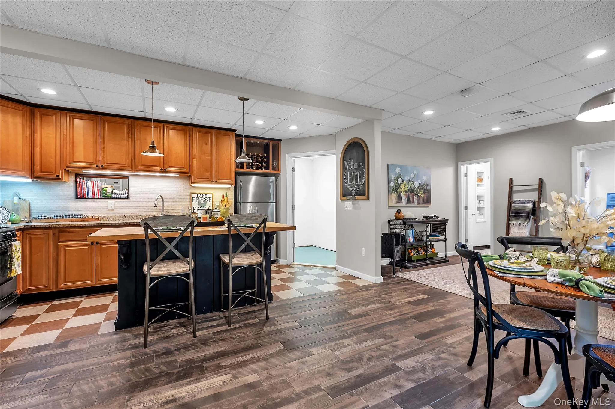 Kitchen with a butcher block island, and stainless steel appliances, Kitchen with a butcher block island, and stainless steel appliances,