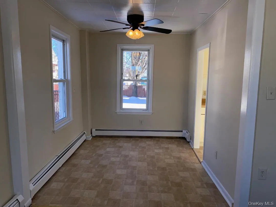 The dining room opens to the living room and the kitchen The dining room opens to the living room and the kitchen