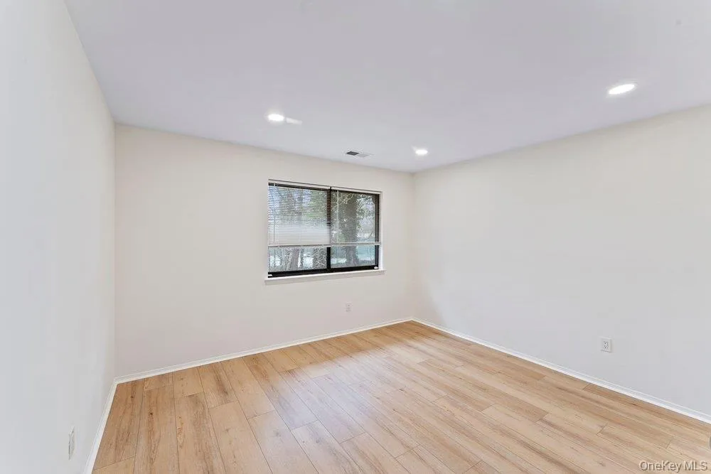 third bedroom with light wood floors third bedroom with light wood floors