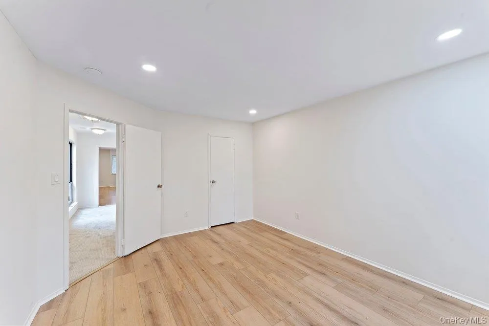second bedroom with light wood floors second bedroom with light wood floors