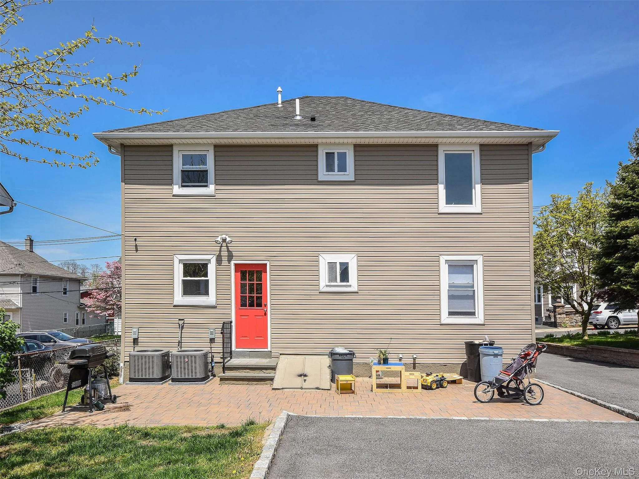 Back door for the 1st floor apartment and shared back patio Back door for the 1st floor apartment and shared back patio