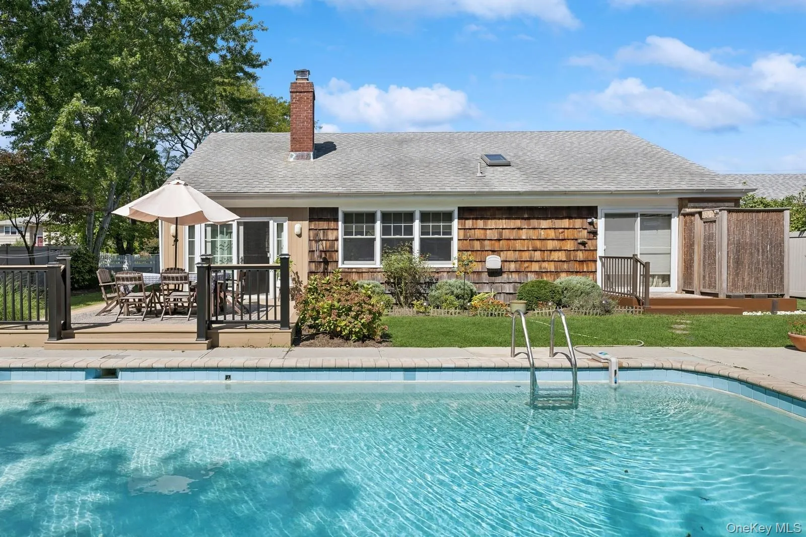 Pool, new deck and flower garden Pool, new deck and flower garden