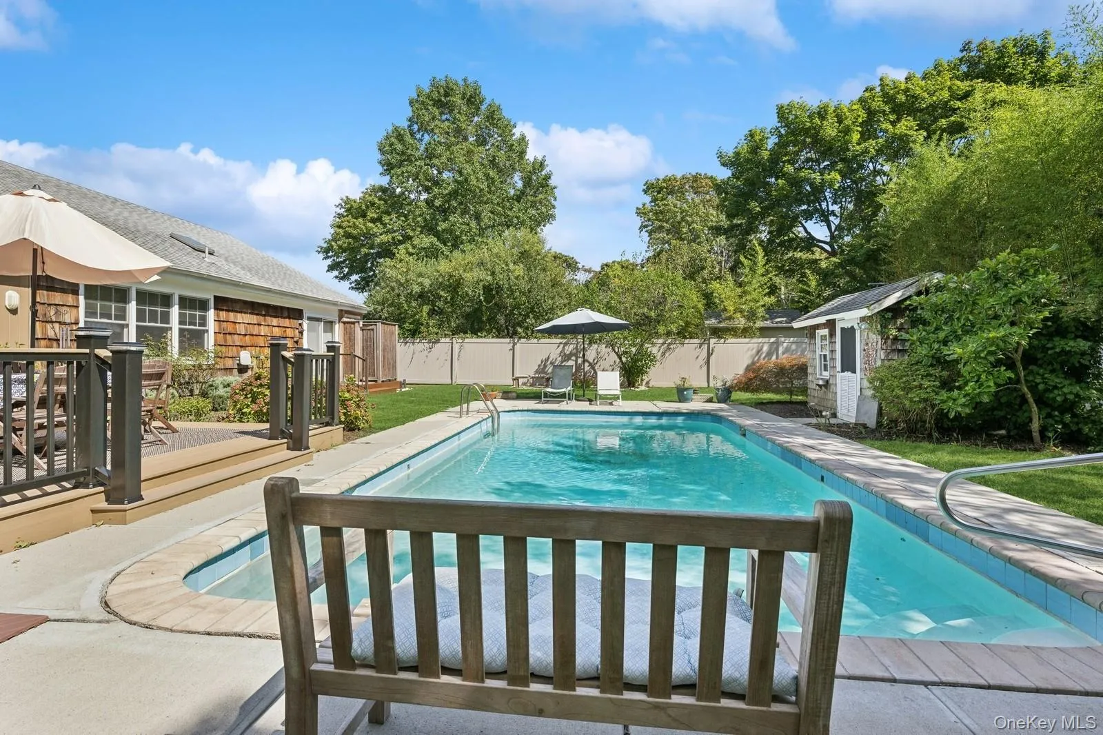 More seating around the beautiful pool More seating around the beautiful pool