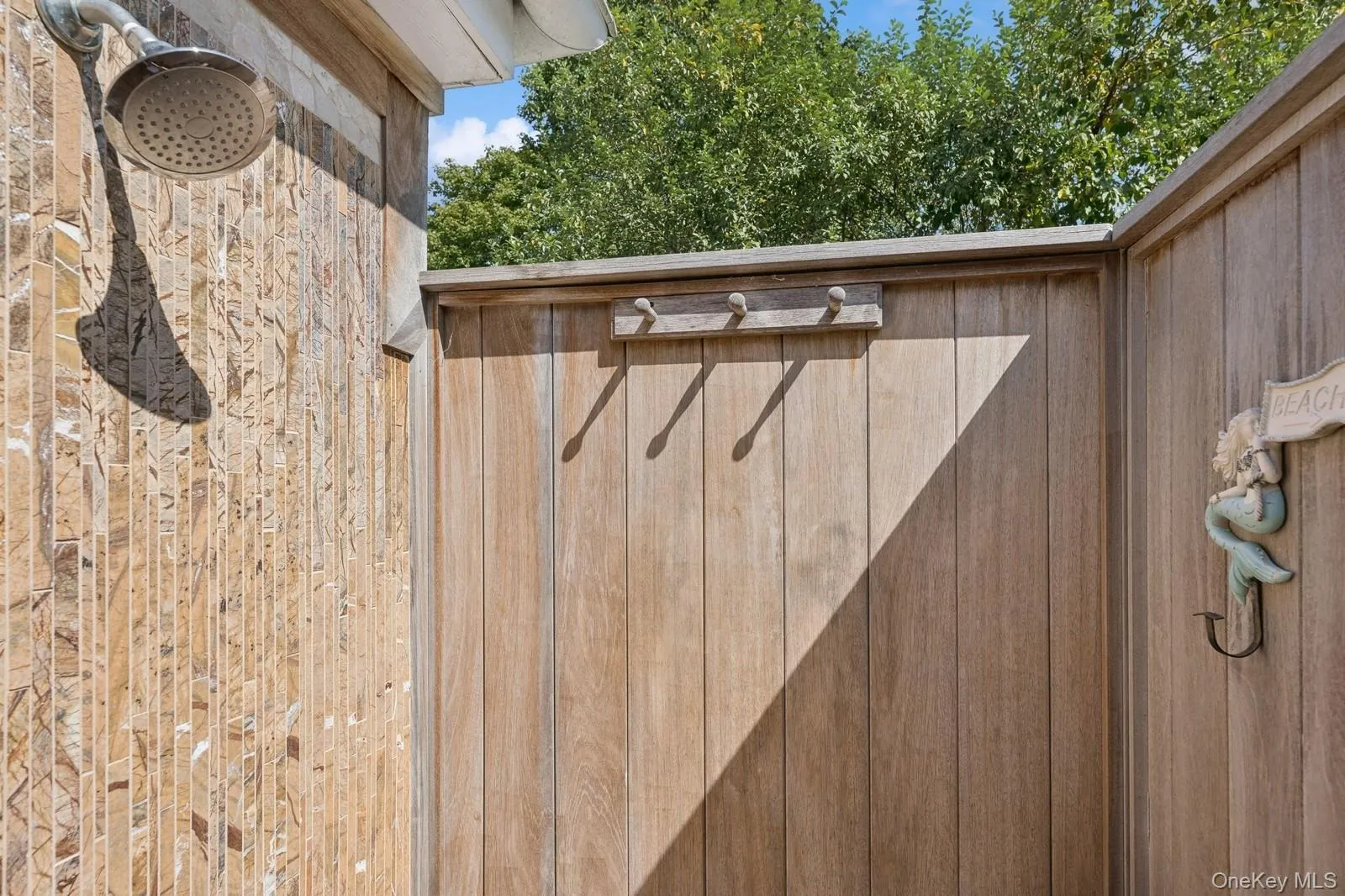 Bamboo outdoor shower steps outside primary suite Bamboo outdoor shower steps outside primary suite