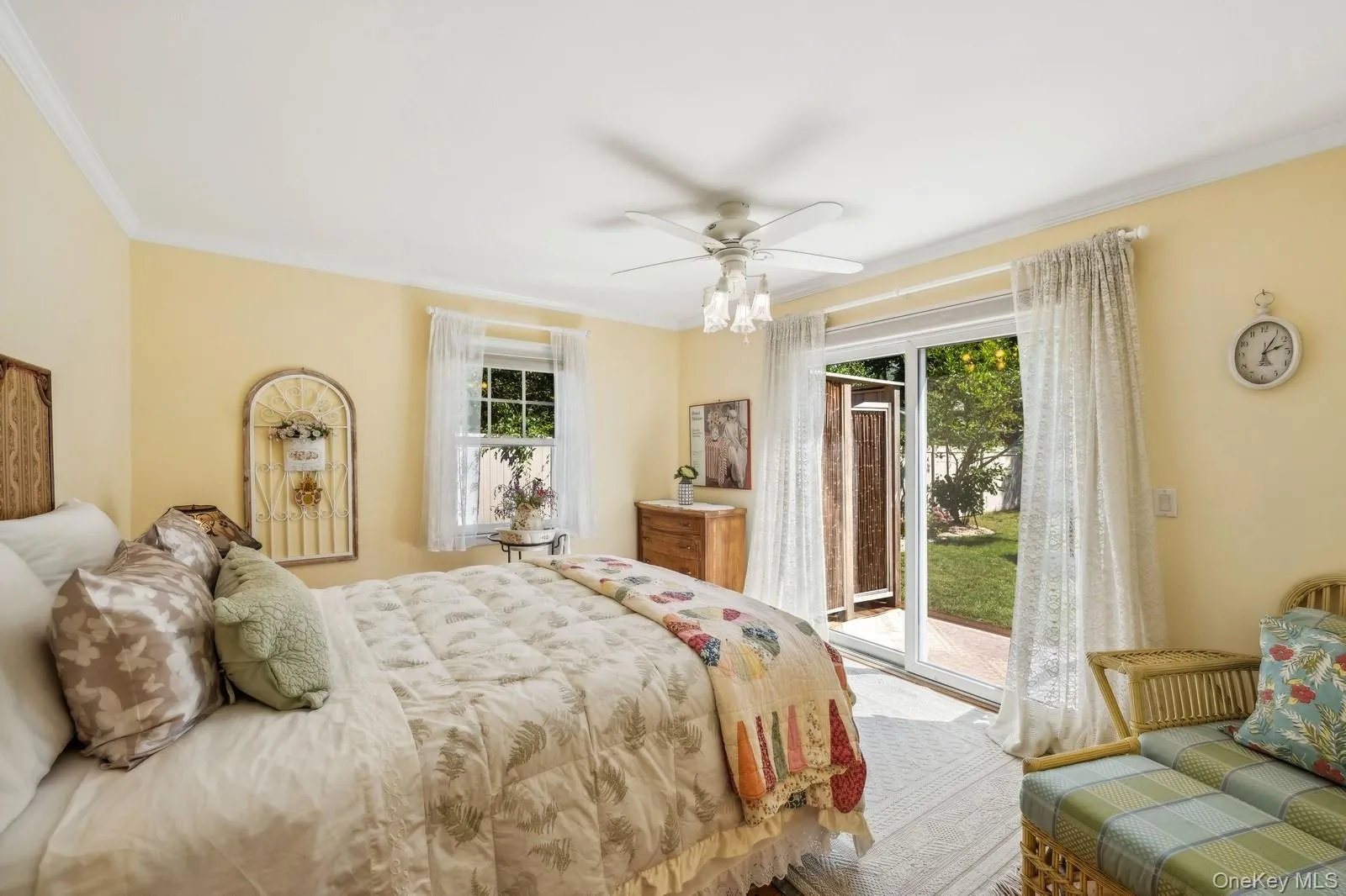 Serene Prmary Bedroom with ceiling fan and access to outdoor shower and backyard Serene Prmary Bedroom with ceiling fan and access to outdoor shower and backyard