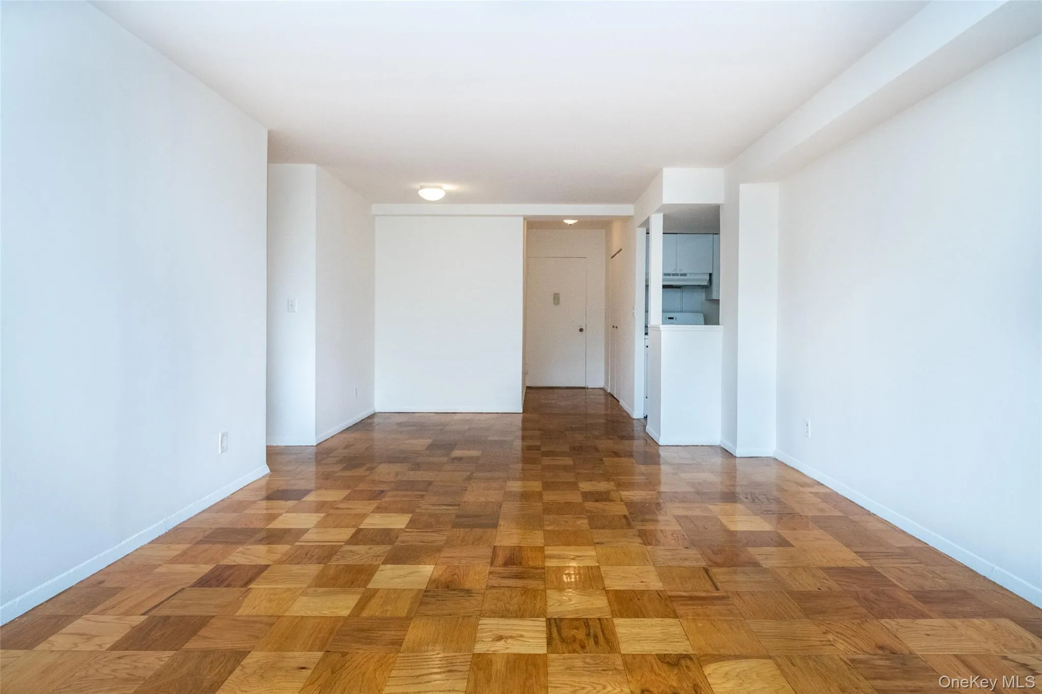 Spare room featuring baseboards Spare room featuring baseboards