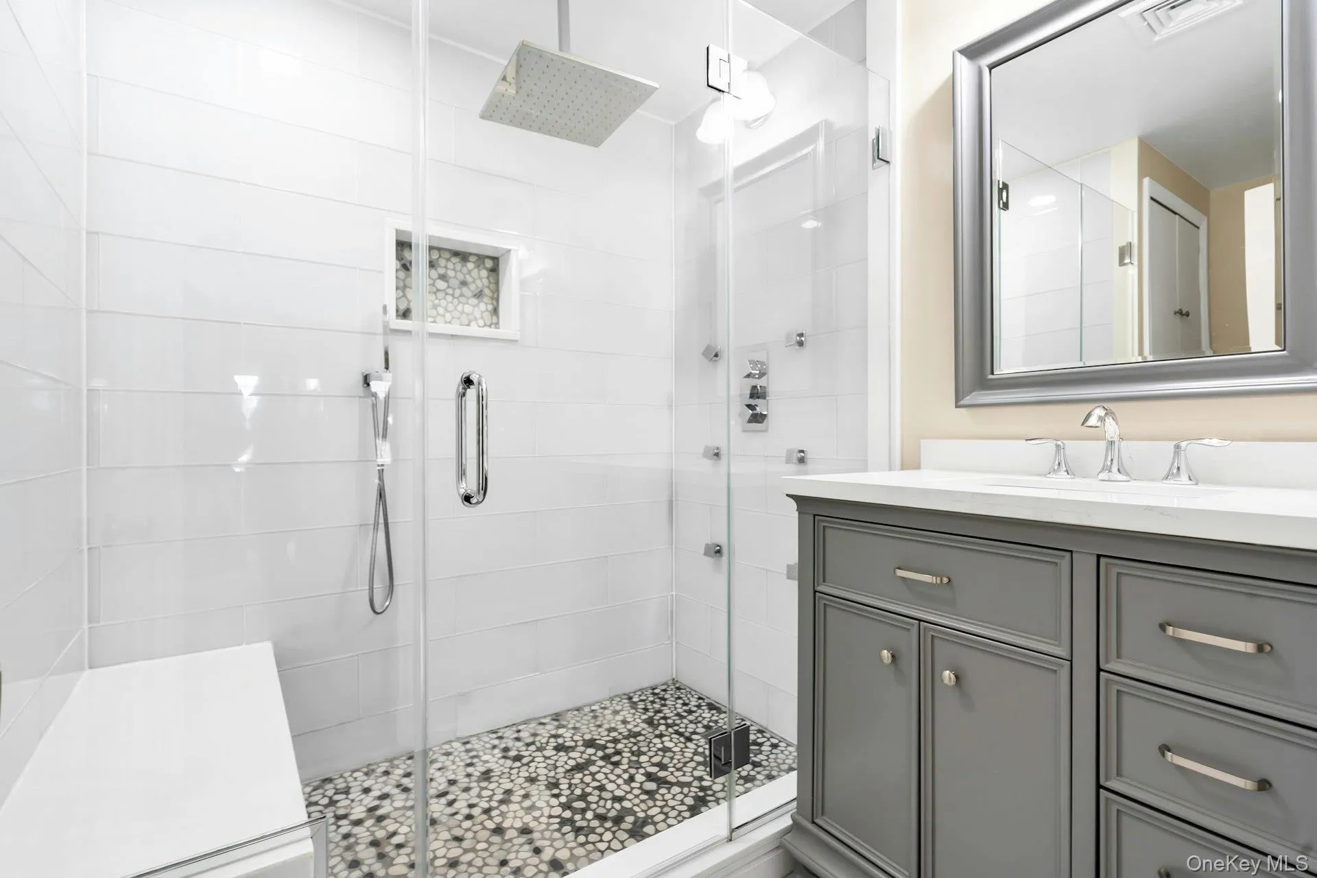 Full bathroom with vanity and a shower stall Full bathroom with vanity and a shower stall