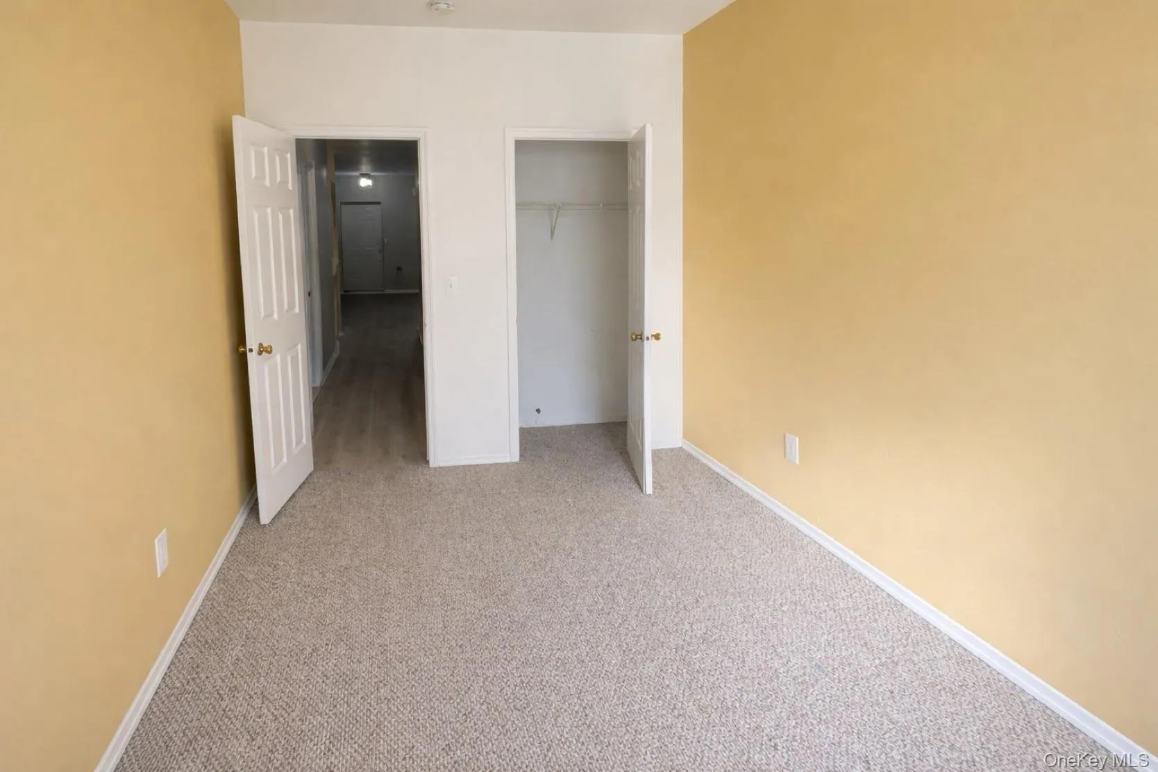 Comfortable bedroom with good natural light, closet space, and neutral finishes. Comfortable bedroom with good natural light, closet space, and neutral finishes.