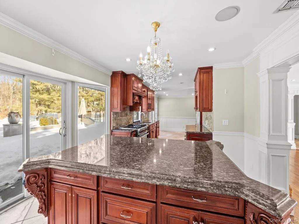 Custom kitchen designs featuring multiple cabinets for ample storage, high-end appliances, and premium materials. Granite Countertop, Kitchen Island Custom kitchen designs featuring multiple cabinets for ample storage, high-end appliances, and premium materials. Granite Countertop, Kitchen Island