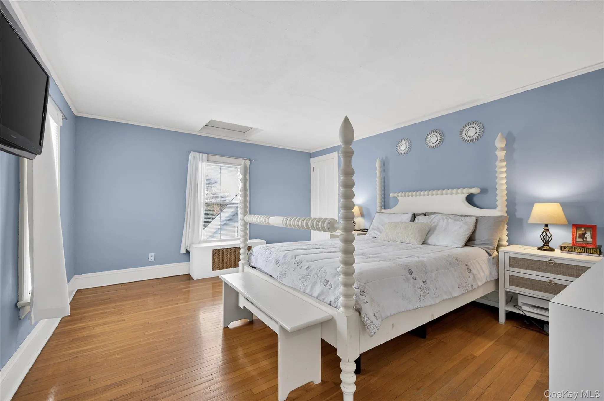 Primary bedroom on the second floor. Hardwood floors and nice mouldings. Primary bedroom on the second floor. Hardwood floors and nice mouldings.