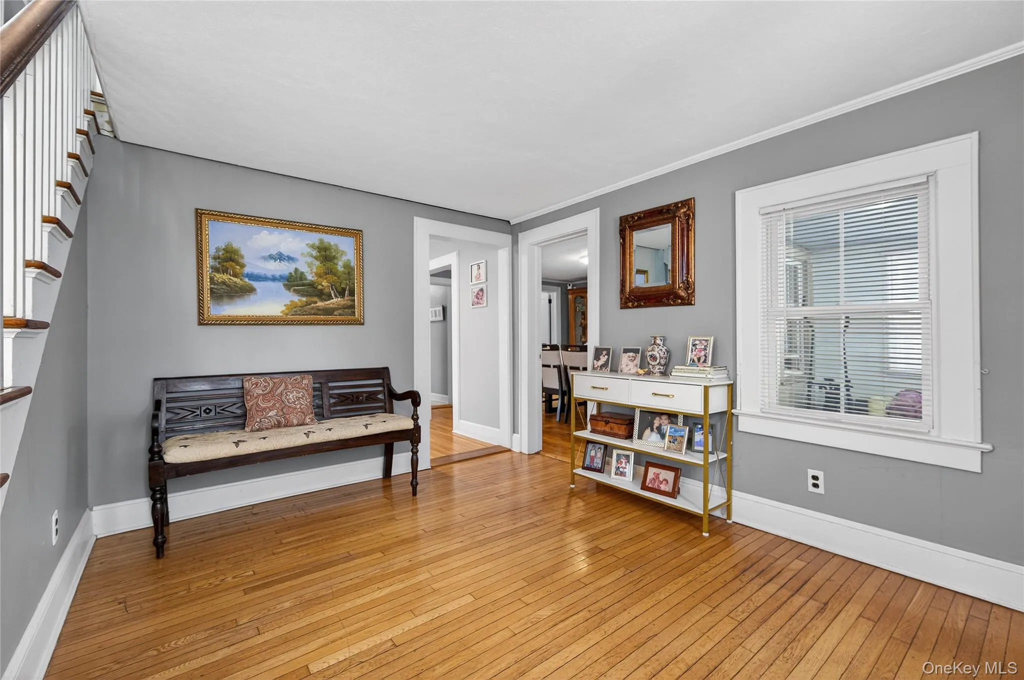 Spacious open entry with hardwoods and hall coat closet. Spacious open entry with hardwoods and hall coat closet.