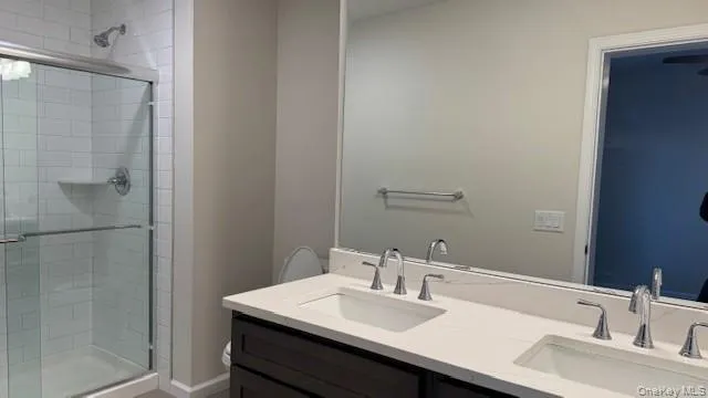 Primary Bathroom with double sink vanity ,walk in shower and linen closet Primary Bathroom with double sink vanity ,walk in shower and linen closet