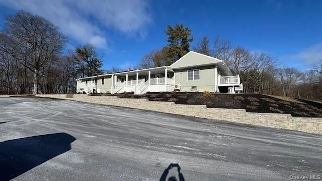 View of front of property featuring a porch View of front of property featuring a porch