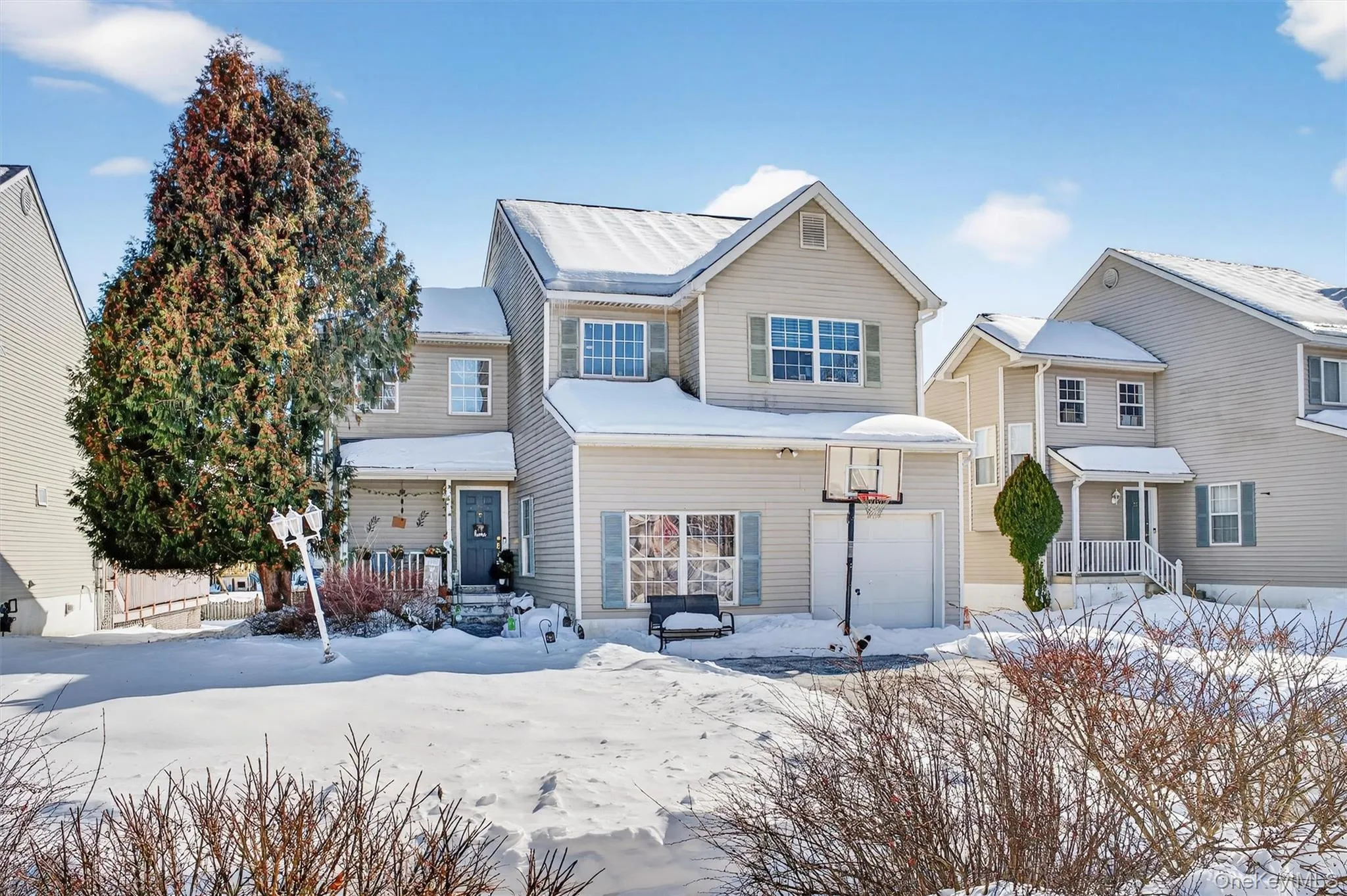 Traditional home with an attached garage Traditional home with an attached garage