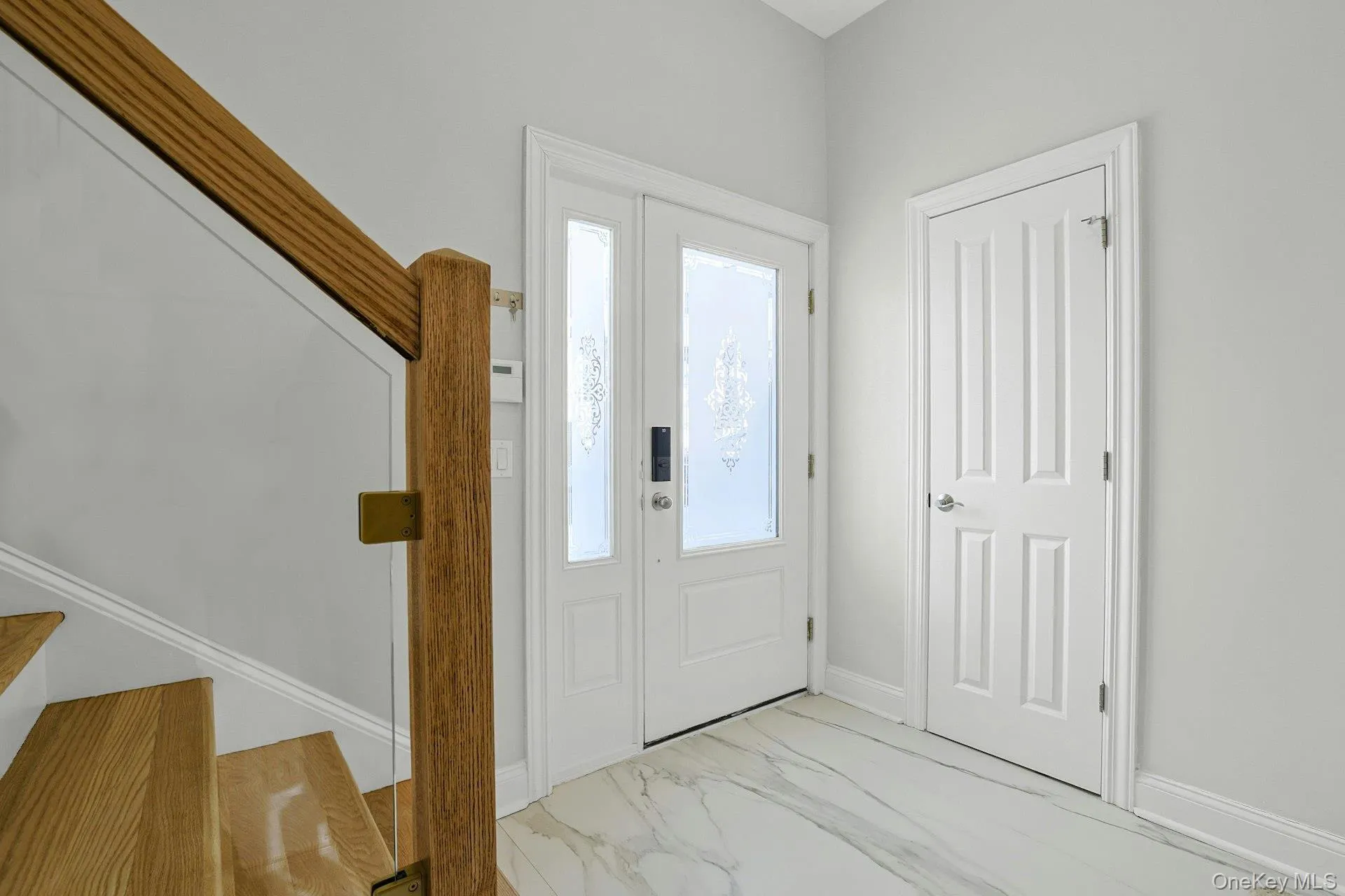 Entry Foyer With 2 Large Closets And Door To GarageQ Entry Foyer With 2 Large Closets And Door To GarageQ