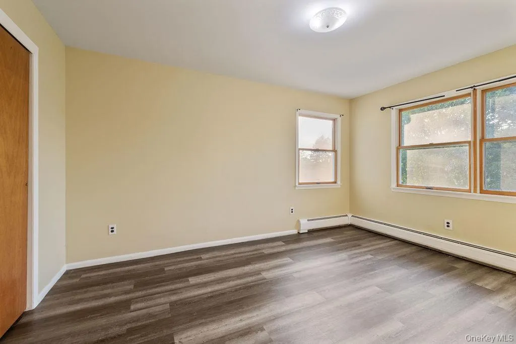 Empty room with wood finished floors Empty room with wood finished floors