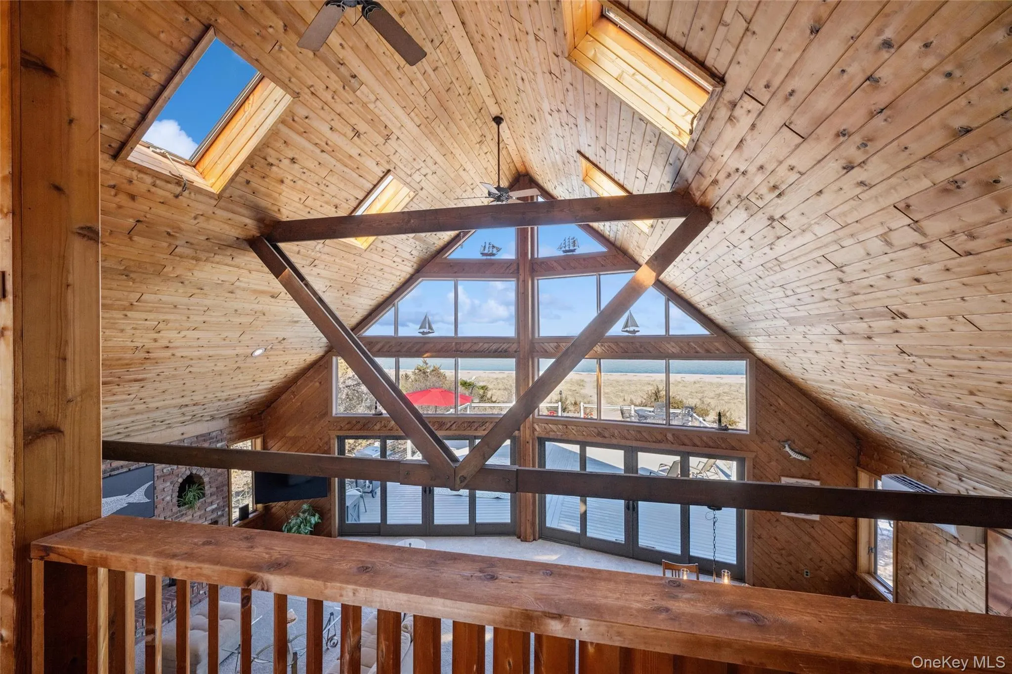 balcony overlooking vaulted ceiling with skylights and non stop water views! balcony overlooking vaulted ceiling with skylights and non stop water views!