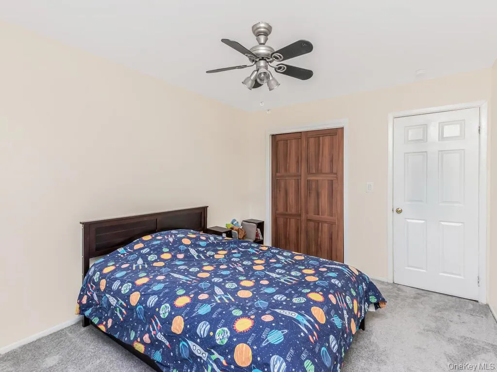 View of Second Bedroom with a Large Closet View of Second Bedroom with a Large Closet