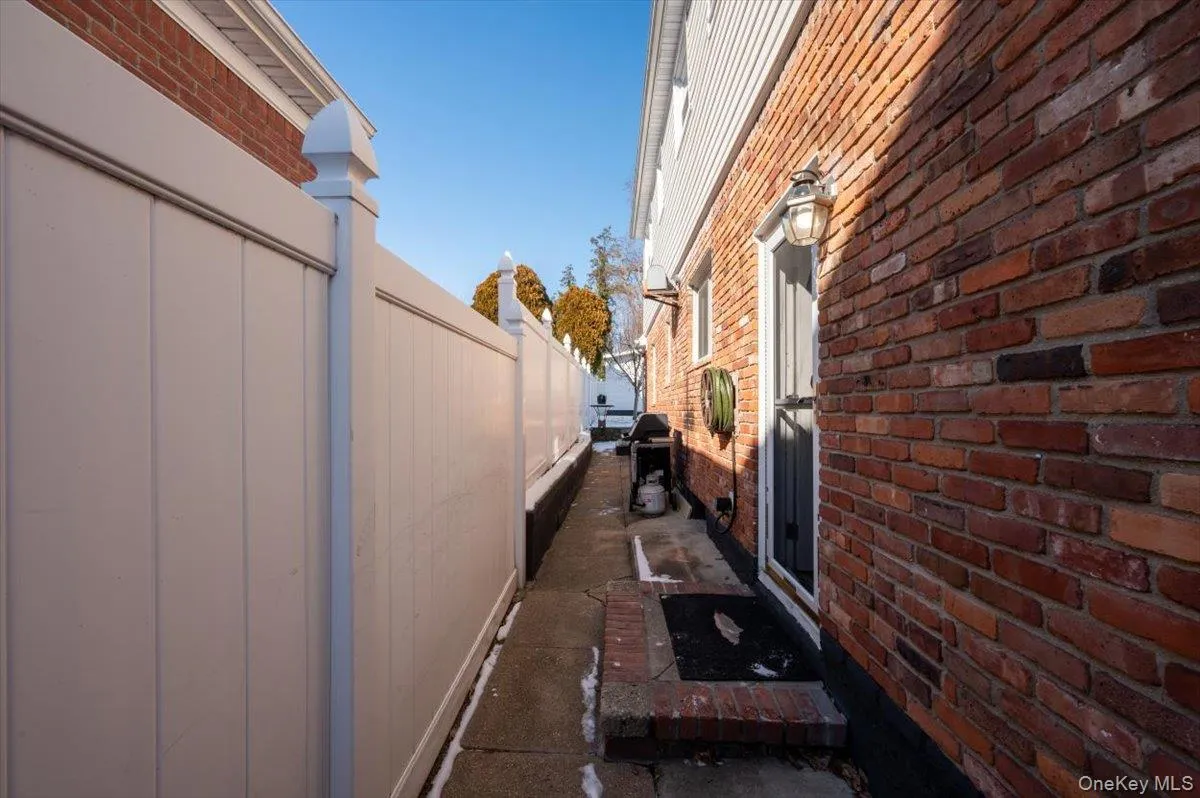 View of property exterior with brick siding View of property exterior with brick siding