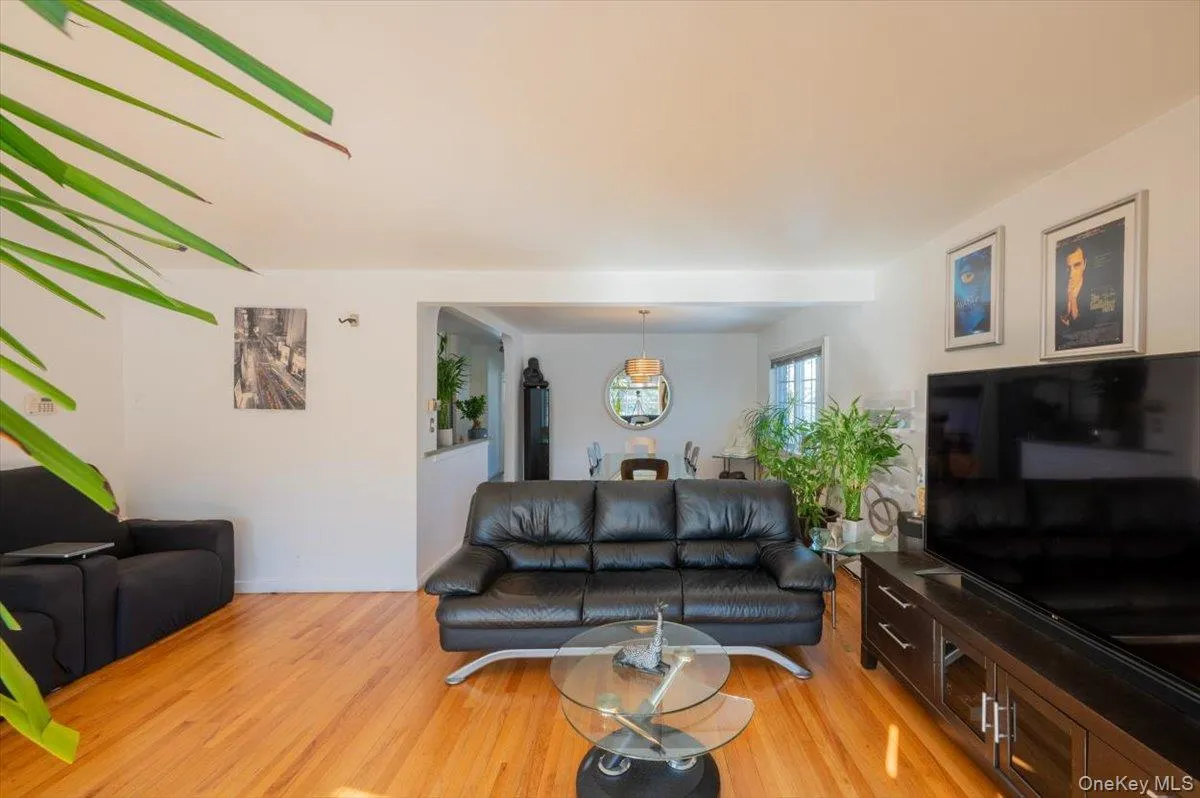 Living room featuring light wood-style floors Living room featuring light wood-style floors