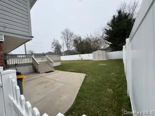 View of yard with a fenced backyard, a shed, a patio, and an outdoor structure View of yard with a fenced backyard, a shed, a patio, and an outdoor structure