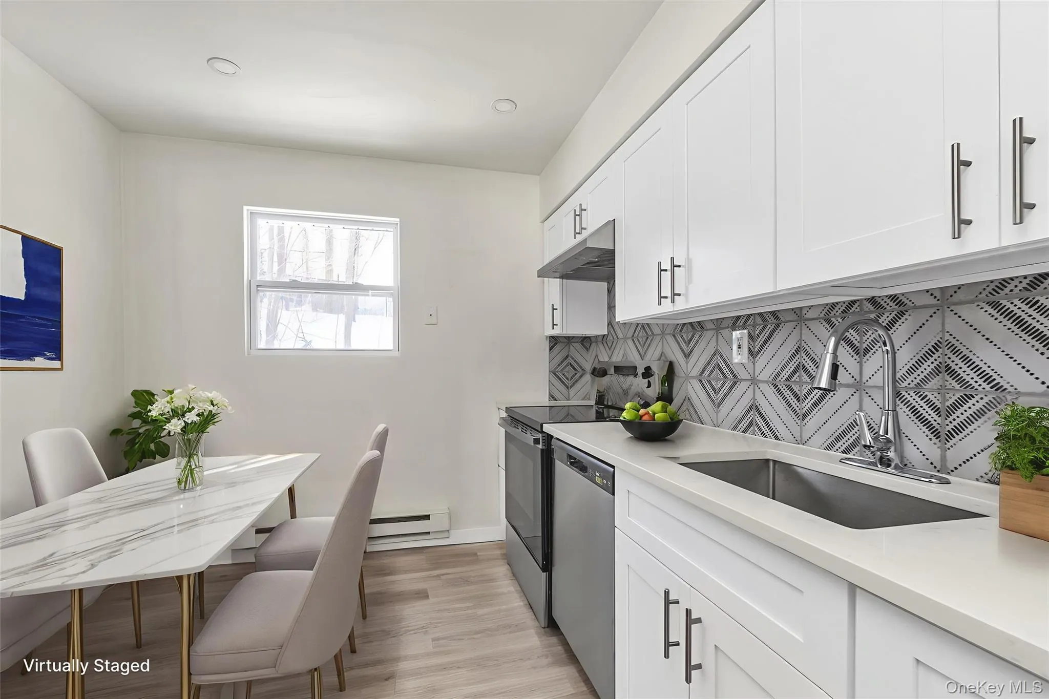 Upstairs kitchen with stainless steel appliances and quartz countertops Upstairs kitchen with stainless steel appliances and quartz countertops
