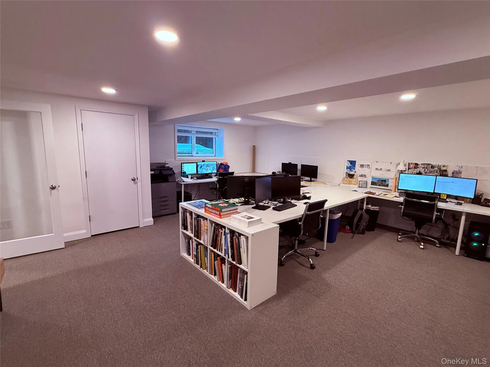 Large Office showing space set up with nine large work stations and a storage closet Large Office showing space set up with nine large work stations and a storage closet