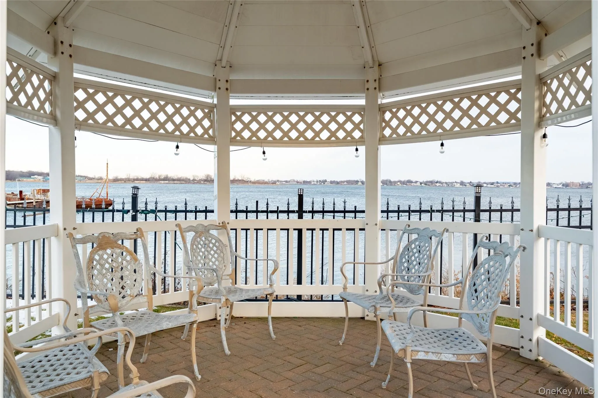 View of patio / terrace featuring a gazebo and a water view View of patio / terrace featuring a gazebo and a water view