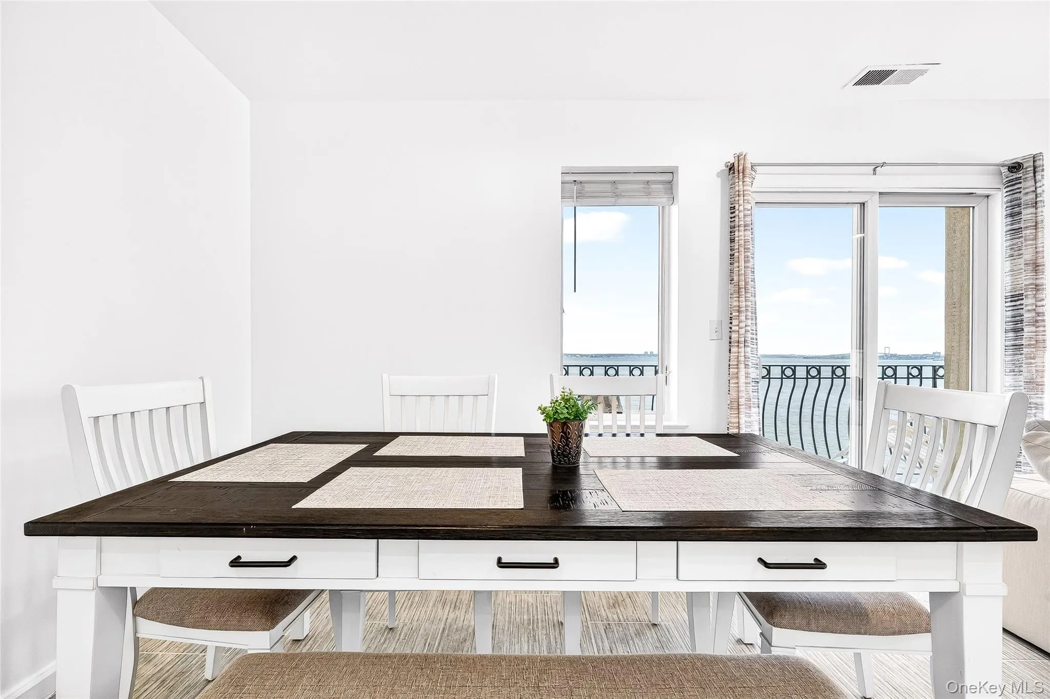 Dining area with long island sound water views. Dining area with long island sound water views.