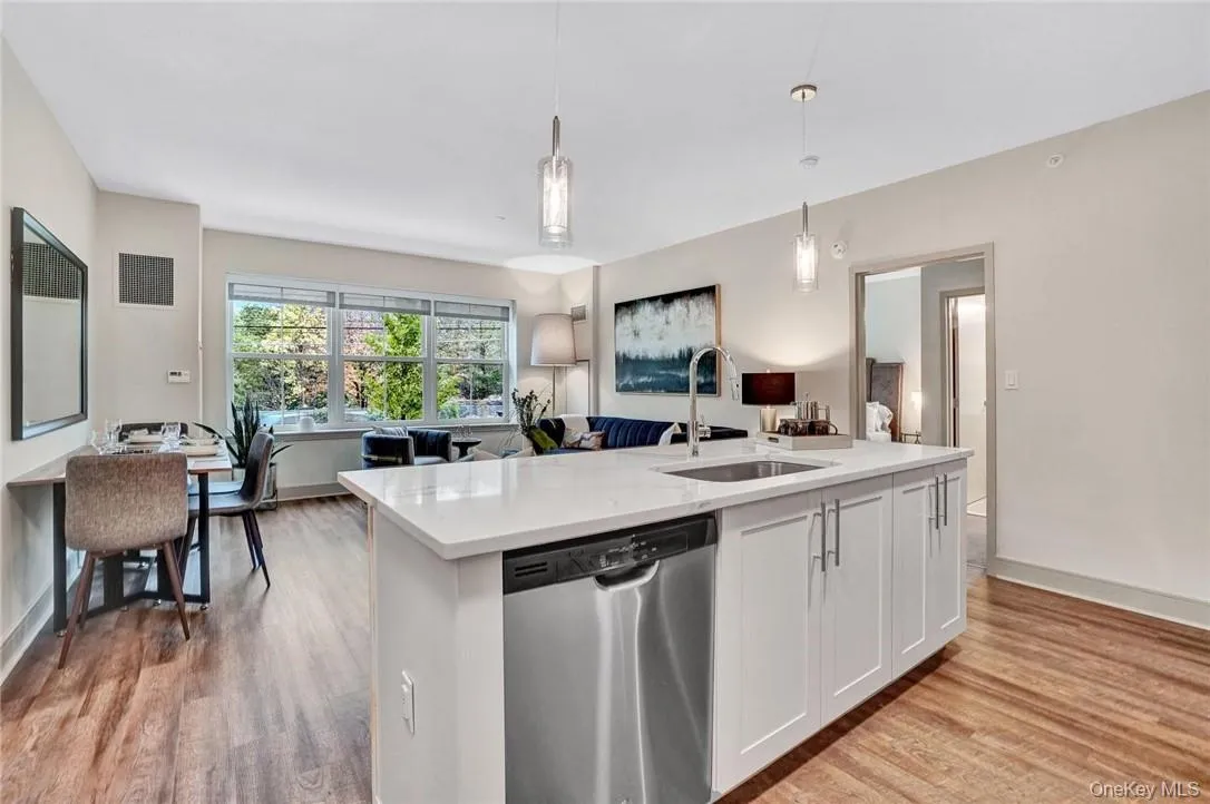 Large kitchen island allows your guests to keep you company Large kitchen island allows your guests to keep you company