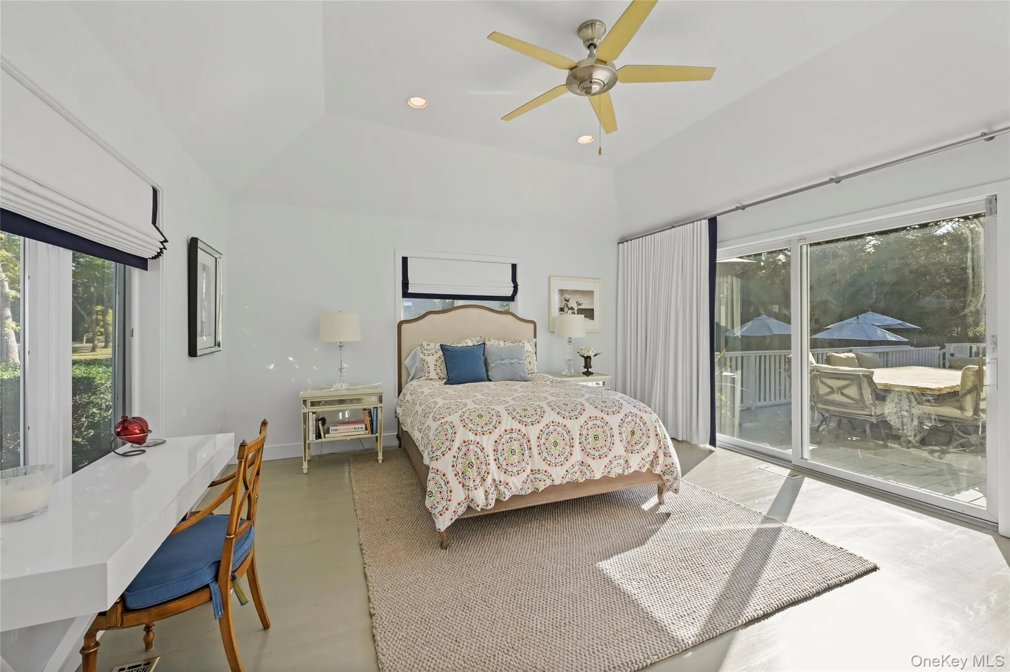 Bedroom with access to outside and ceiling fan Bedroom with access to outside and ceiling fan