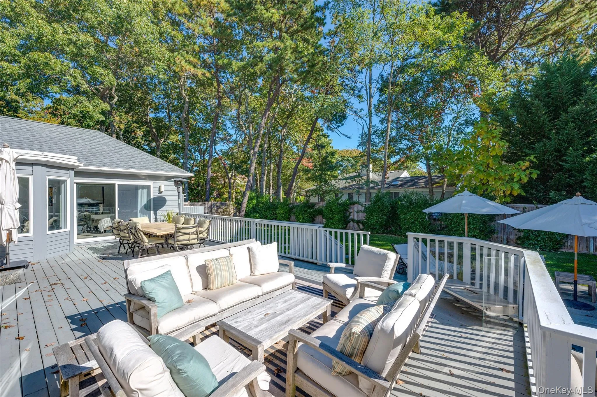 Deck featuring an outdoor hangout area Deck featuring an outdoor hangout area