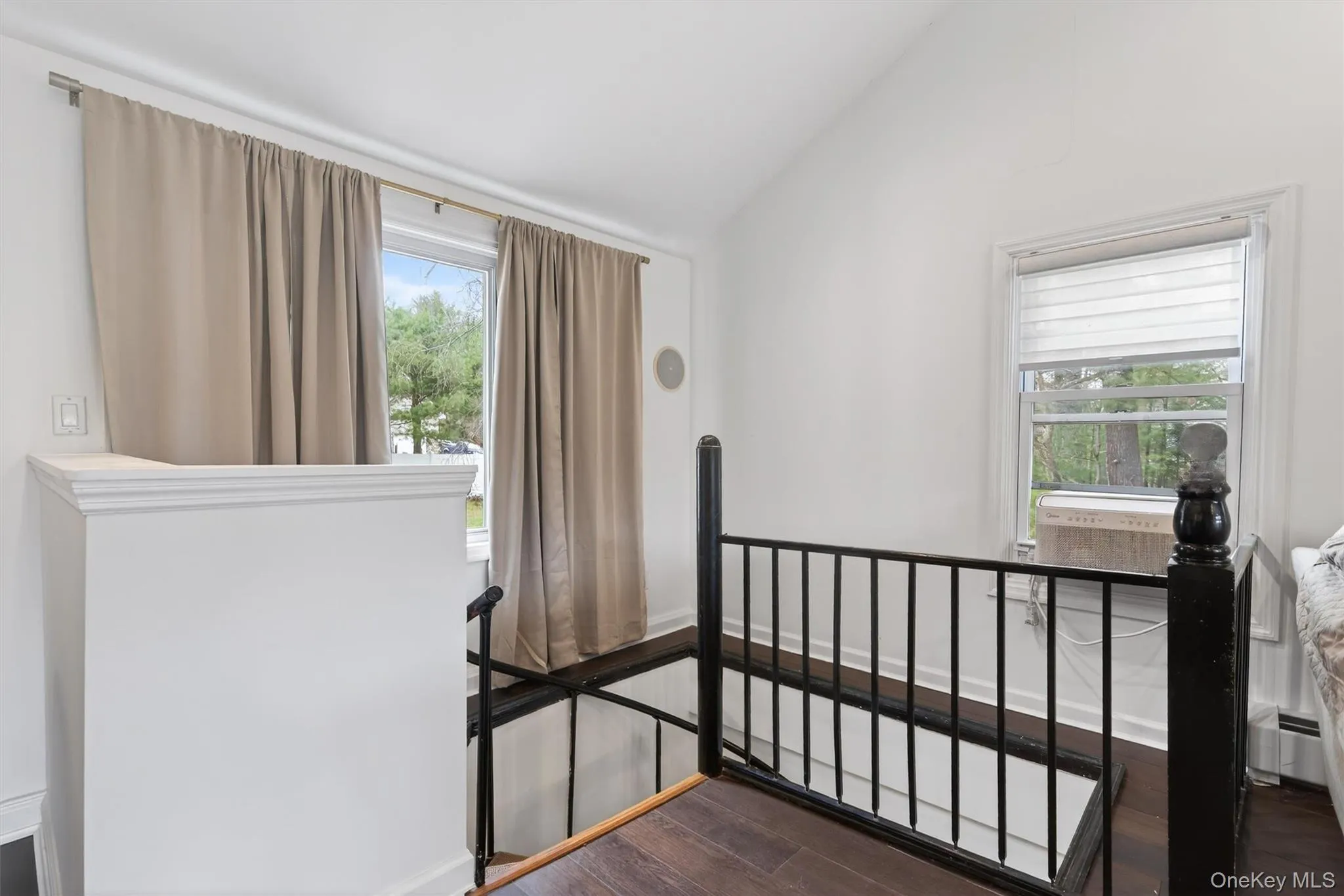 spial stairs to family room from living room. There's another staircase down spial stairs to family room from living room. There's another staircase down