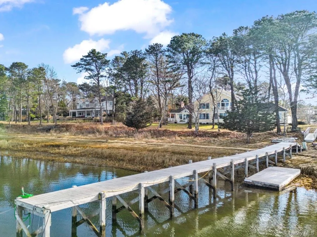 View of dock featuring a water view View of dock featuring a water view