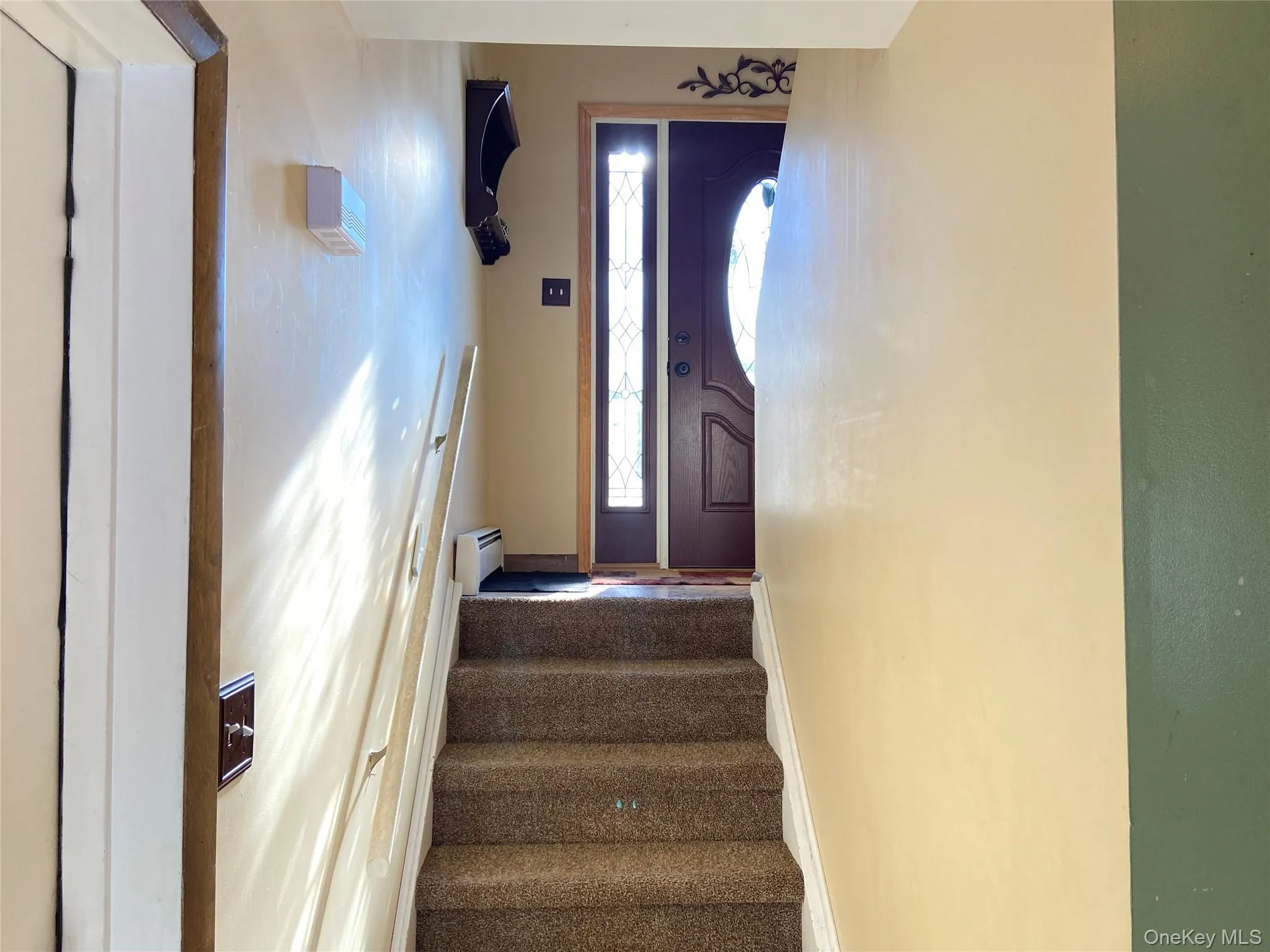 Staircase from front door. Staircase from front door.