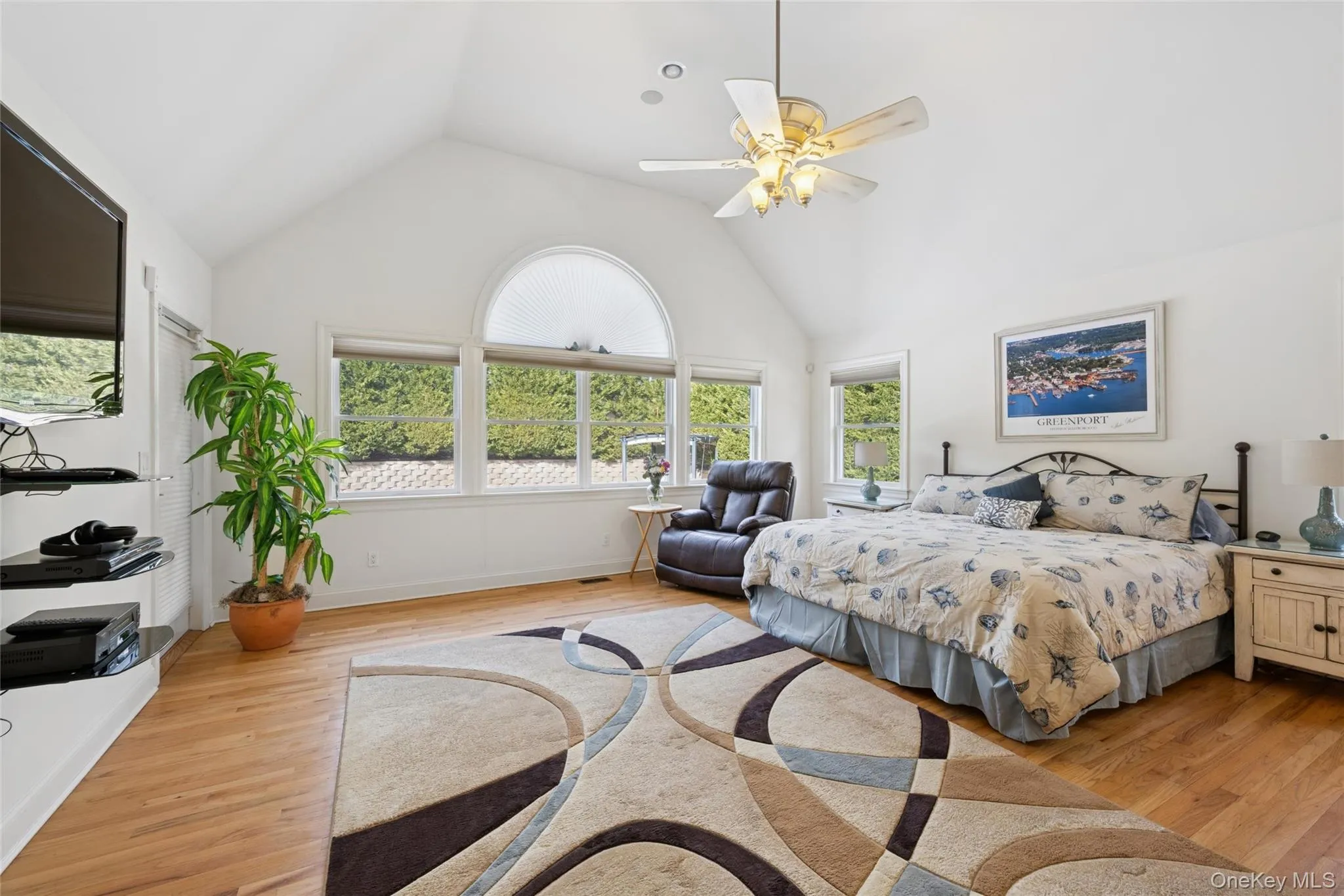 First floor primary with en-suite bath poolside views First floor primary with en-suite bath poolside views