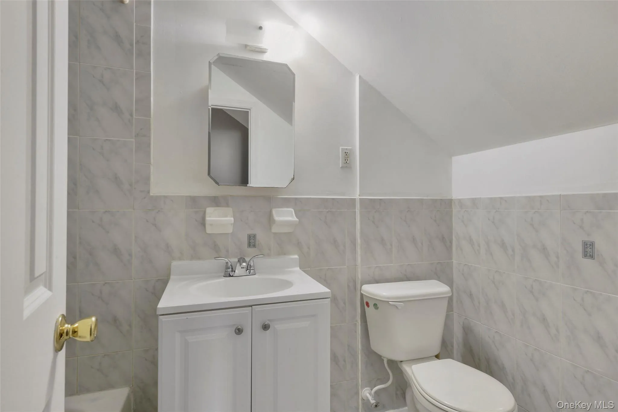 2nd level full bathroom at upstairs landing. 2nd level full bathroom at upstairs landing.