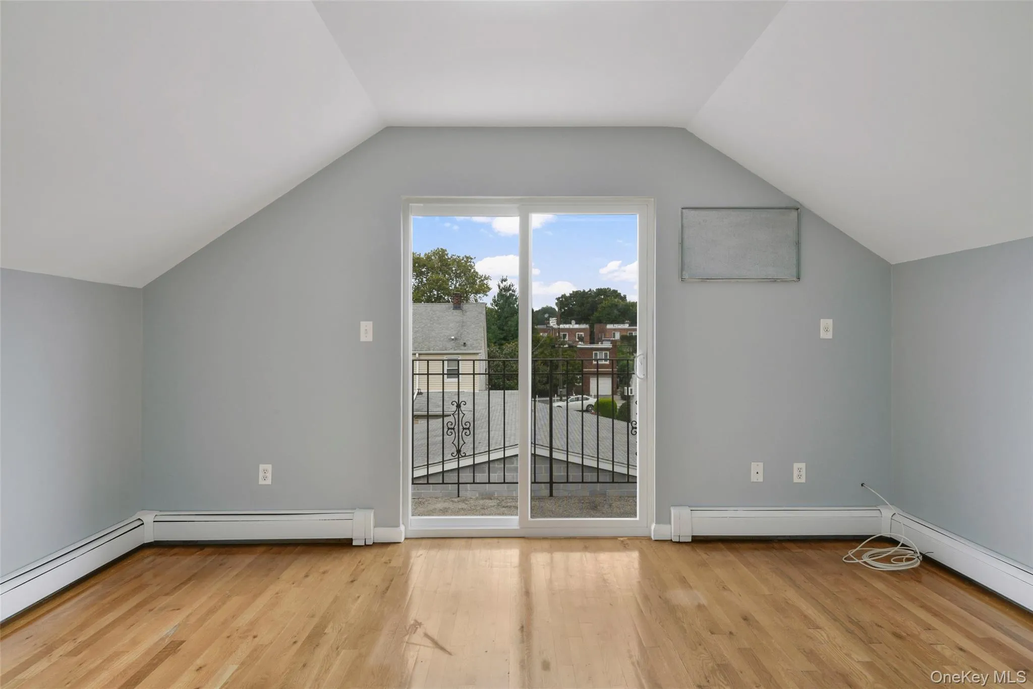 Primary bedroom with sliding doors and screen to balcony. Primary bedroom with sliding doors and screen to balcony.