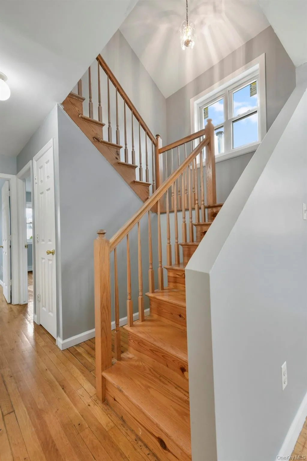 Airy stairway to private primary bedroom and 2nd full bathroom Airy stairway to private primary bedroom and 2nd full bathroom