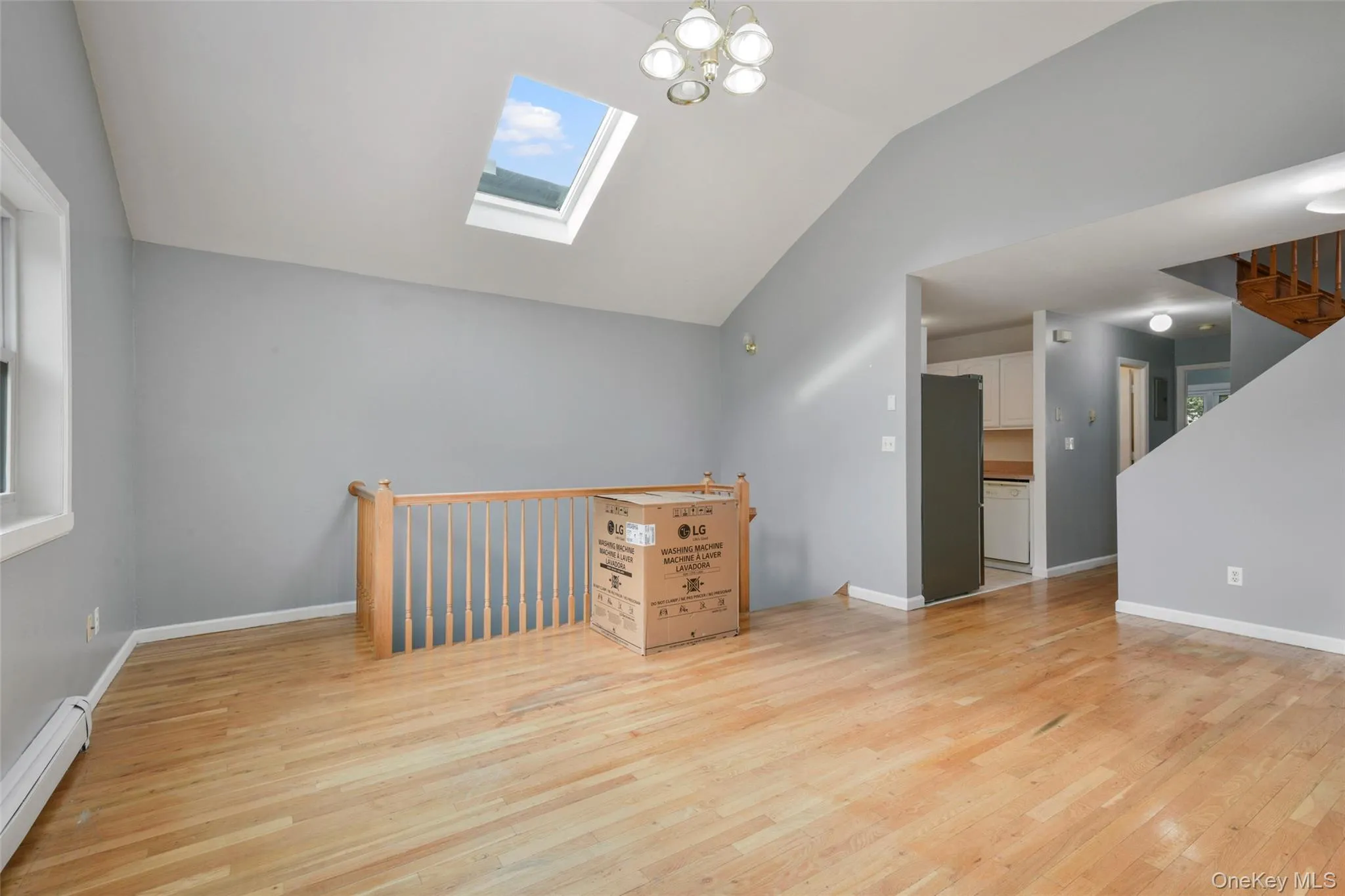 Living and Dining space open to Kitchen and upstairs Living and Dining space open to Kitchen and upstairs