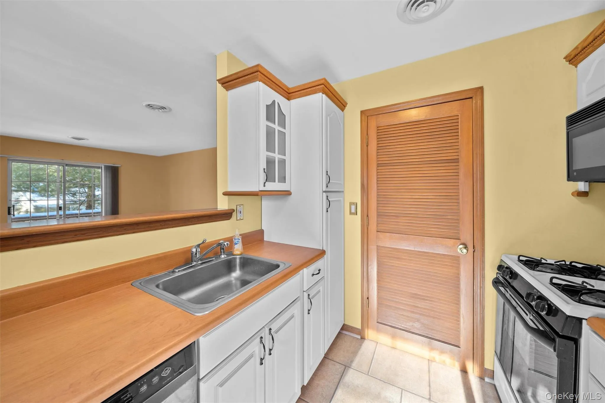 The kitchen is open into the living room. The kitchen is open into the living room.